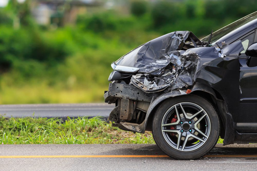 Front,Of,Black,Car,Get,Damaged,By,Accident,On,The Totalschaden
