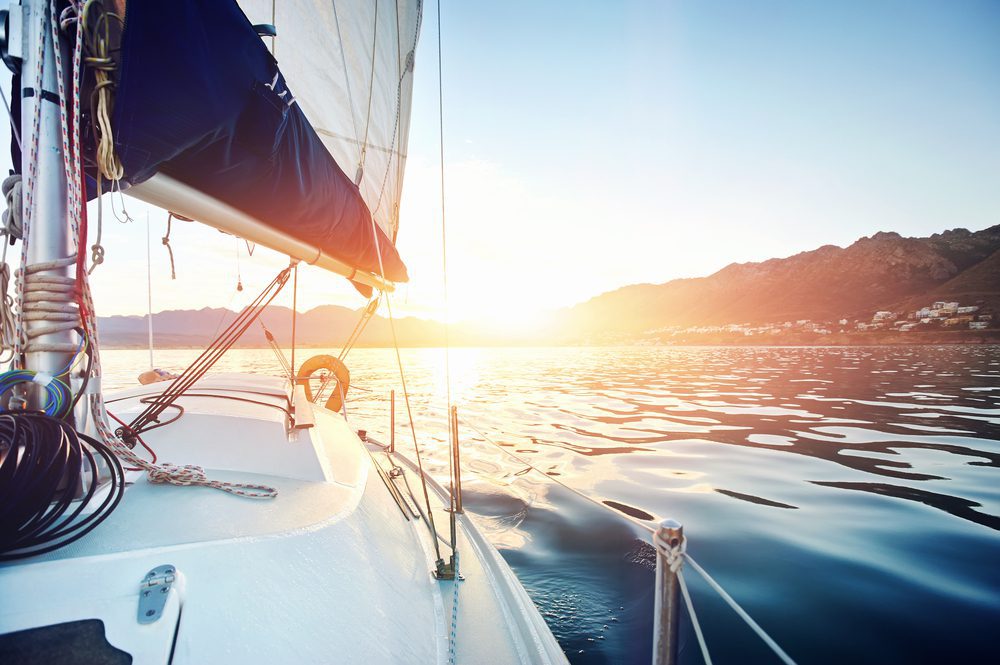 Sailing,Yacht,Boat,On,On,Ocean,Water,At,Sunrise,With